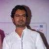 Nawazuddin Siddiqui poses for the media at the DVD Launch of Lunchbox