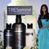 Diana Penty poses with the Tresseme product at the launch