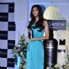 Diana Penty poses for the media with Tresseme product at the endorsement event
