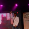 Ajay Devgn waves to the students at the Promotions of Singham Returns