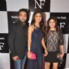Shilpa Shetty, Shamita Shetty and Raj Kundra pose for the media