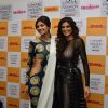 Shilpa Shetty and Sushmita Sen pose for the media at Lakme Fashion Week