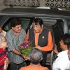Ashok Pandit greets Manoj Kumar with a bouquet of flowers at the Bhoomipoojan of IFTDA's New Office