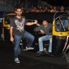 Emraan Hashmi and Kunal Deshmukh pose with the Auto Rickshaw