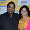 Shankar Mahadevan poses with wife at Shaan's Live Concert