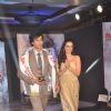 Evelyn Sharma walks the ramp with the winner at Mandate Model Hunt 2014