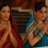 Bhumi and Niharika praying to God