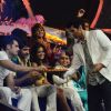 Aditya Roy Kapur distributes sweets to the contestants on Jhalak Dikhhlaa Jaa