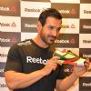 John Abraham showcases a Sport Shoe at the Press Meet of Reebok