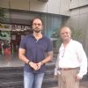 Rohit Shetty poses with a guest at Whistling Woods
