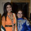 Shilpa Shetty poses with a guest at the Promotion of Iosis Medi Spa
