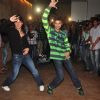 Tiger Shroff shakes a leg with a friend at the Launch of his New Video