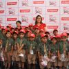 Lara Dutta poses with kids at the Colgate Bright Smiles Celebration