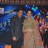 Shah Rukh Khan and Deepika Padukone pose for the media at the Music Launch of Happy New Year