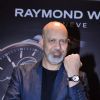 Loy Mendosa pose with a watch at the Launch of Raymond Weil Store
