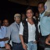 Shah Rukh Khan poses for the media at Airport while leaving for Slam Tour