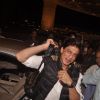 Shah Rukh Khan snapped at Airport while leaving for Slam Tour