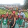 Aditya and Parineeti pose with school girls at Daawat-e-Ishq Food Yatra