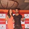 Shraddha Kapoor and Shahid Kapoor pose with the Samsung Smart phone at the Promotion of Haider