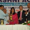 Priyanka Chopra receives a Trophy at Priyadarshini Academy Global Awards 2014