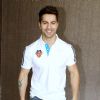 Varun Dhawan poses for the media at FC Goa Official Jersey Launch