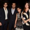 Simone Khan poses with her husband and children at her Store Launch