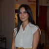 Kim Sharma poses for the media at the Helping Hands Exhibition