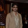 Irrfan Khan poses for the media at the Book Launch of Haider, Omkara and Maqbool