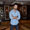 Shahid Kapoor poses for the media at the Book Launch of Haider, Omkara and Maqbool