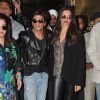Deepika Padukone and Shah Rukh Khan pose for the media at Airport