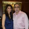 Zeba Kohli poses with her husband at the Project Seven Preview