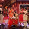 Rekha cuts a cake on Comedy Nights with Kapil
