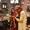 Upen and Sonali dressed up as bride and groom for the task