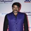 Manoj Tiwari poses for the media at the Launch of Planet Hollywood