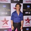 Tiger Shroff poses for the media at the Star Box Office Awards