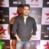 Arbaaz Khan poses for the media at the Star Box Office Awards