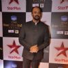 Rohit Shetty poses for the media at Star Box Office Awards