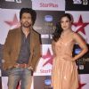 Nikhil Dwivedi and Richa Chadda pose for the media at Star Box Office Awards