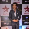 Karan Wahi poses for the media at Star Box Office Awards