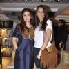 Twinkle Khanna poses with a friend at Laila Singh Showcase