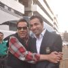 Dharmendra Singh Deol poses with a friend at the Music Launch of Badlapur Boys