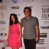 Ronnie Screwvala poses with wife at the 16th MAMI Film Festival