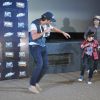 Hrithik Roshan shakes a leg with a young fan at the Special Screening of Bang Bang