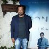 Anurag Kashyap poses for the media at the Special Screening of Ben Affleck's Gone Girl