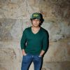 Sonu Niigam poses for the media at the Special Screening of Fury