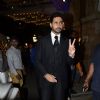 Abhishek Bachchan poses for the media at SBS Party
