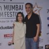 Vidhu Vinod Chopra poses with wife at the Closing Ceremony of 16th MAMI Film Festival