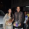 Ashutosh Gowarikar poses with wife at Aamir Khan's Diwali Bash