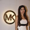 Parvathy Omanakuttan poses for the media at Michael Korrs Store Launch