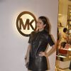 Amrita Arora poses for the media at Michael Korrs Store Launch